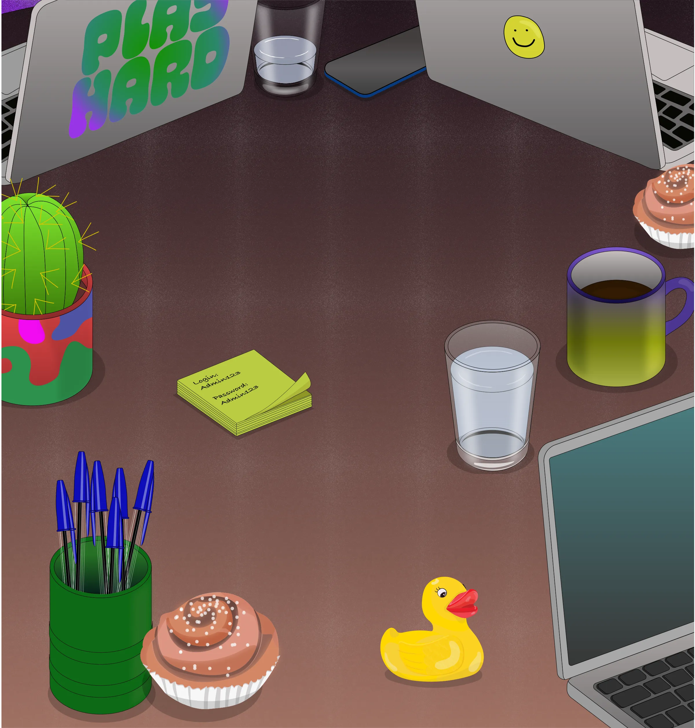 A desk scene — two laptops (one reading PLAY HARD, one with a smiley face), a glass of water, a phone, a cactus, sticky notes, a coffee mug, a cup of pens, cupcakes and a rubber duck